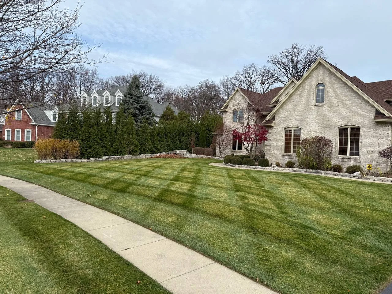 Terramorph Brick home with striped lawn