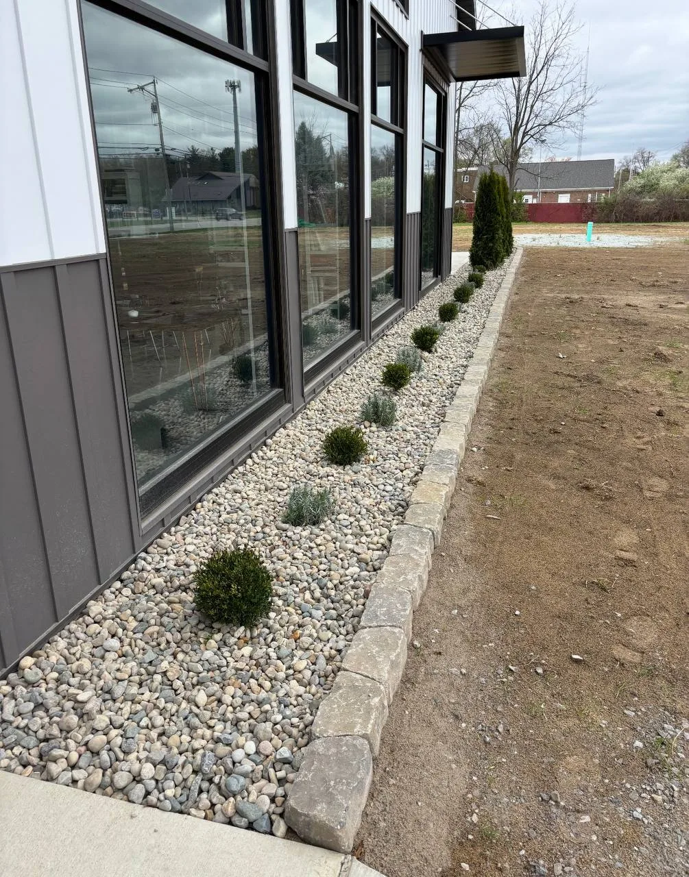 Terramorph Commercial rock bed along a building