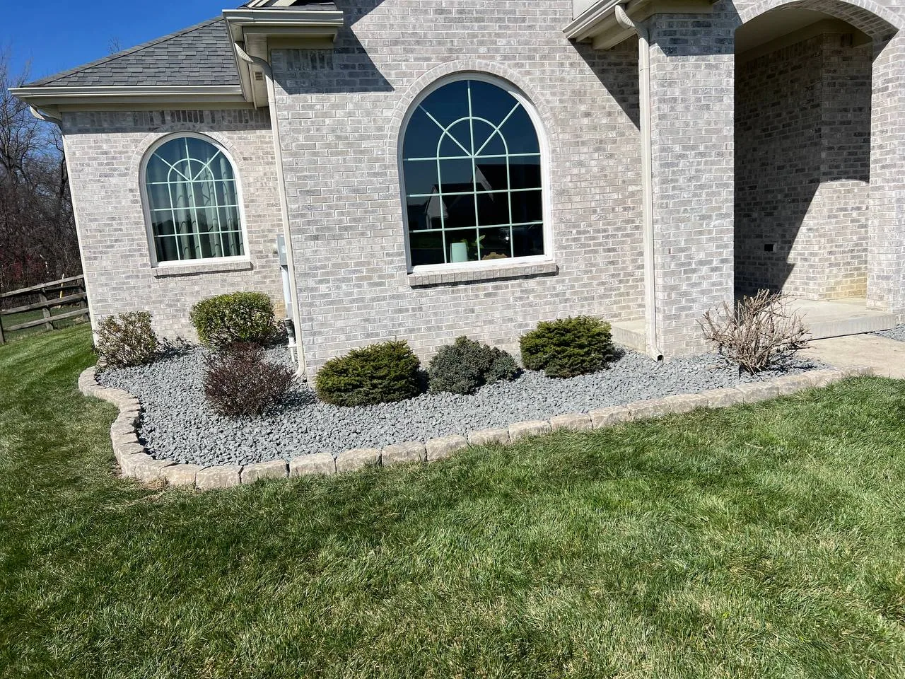 Terramorph Estate front beds with white rock