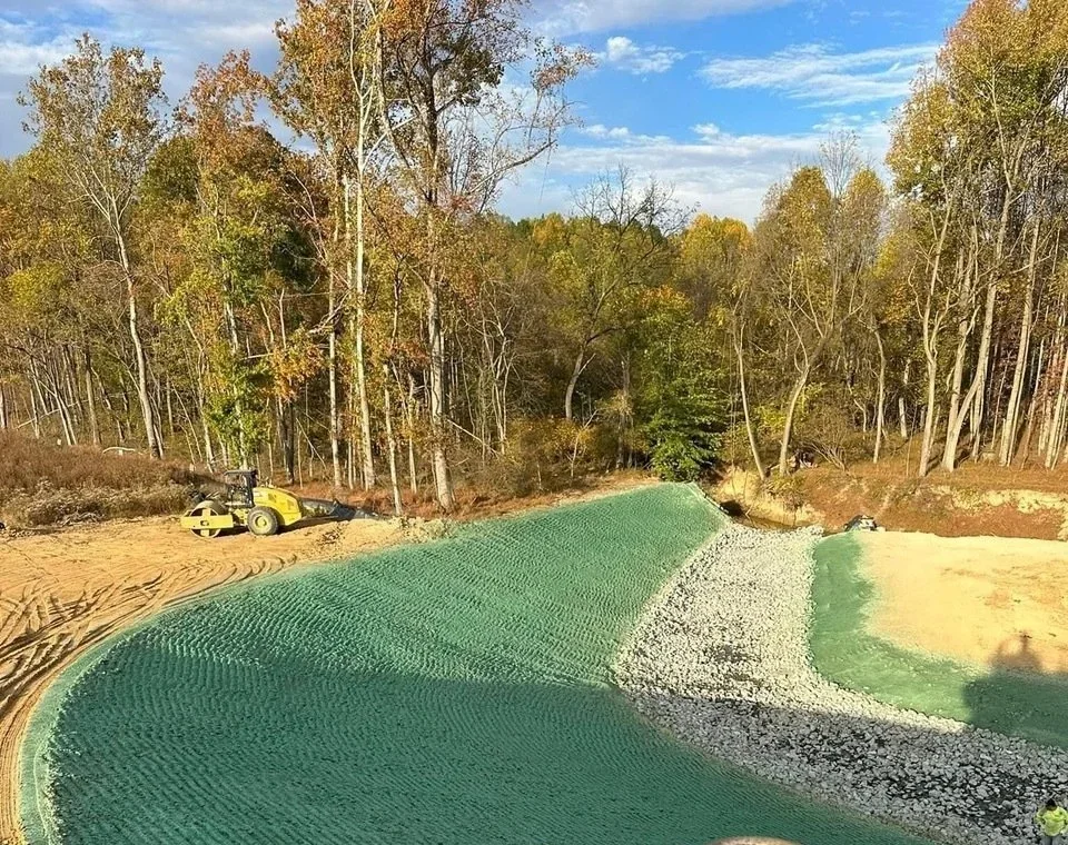 Terramorph Hydroseeded slope with a rock channel